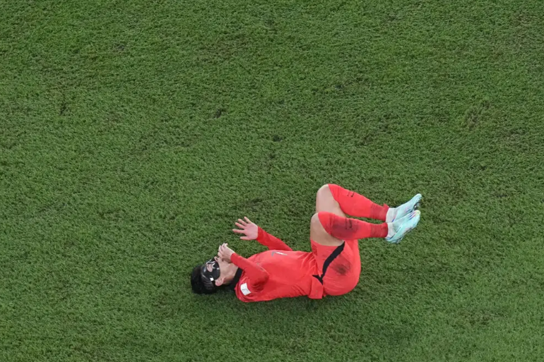 Reaksi Son Heung-min setelah menerima tackle pada Piala Dunia Brasil dan Korea Selatan